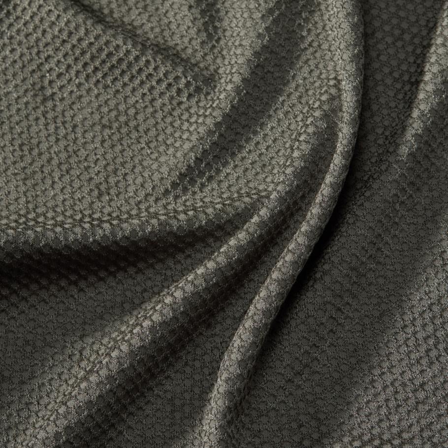 a close up of a piece of fabric from a fleece mid layer with an octagon pattern on it