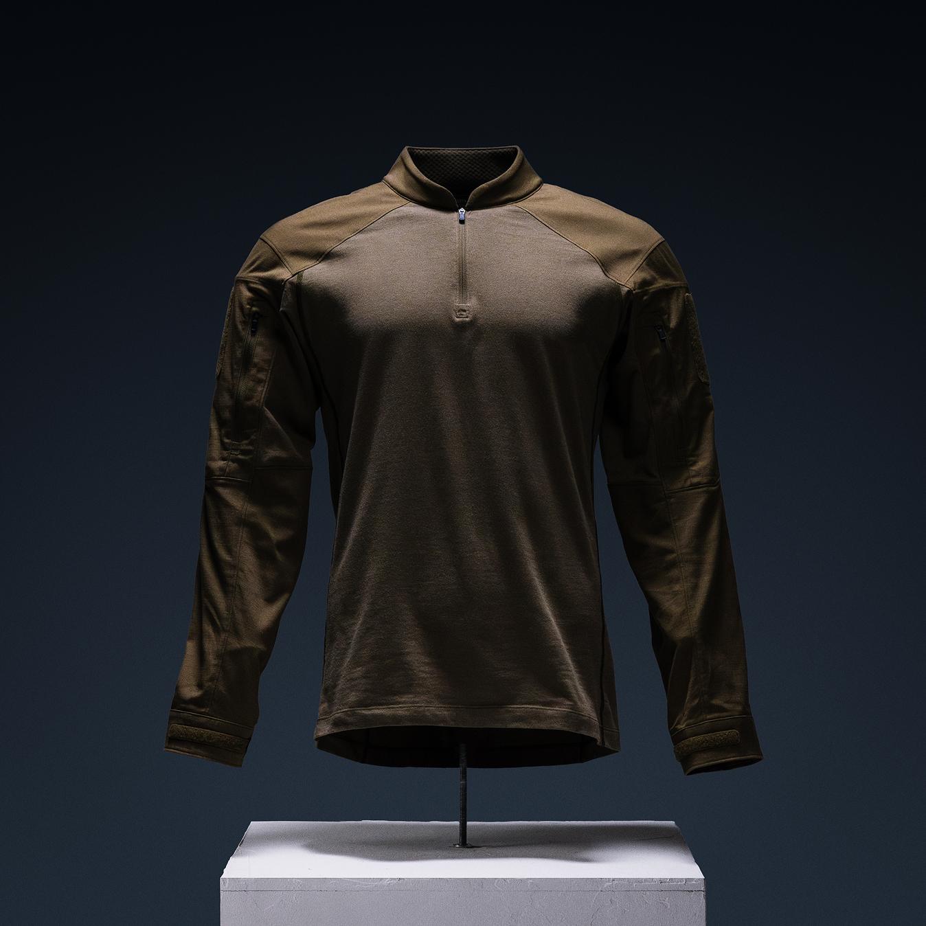 Dark olive long-sleeve quarter-zip tactical shirt with arm pockets.