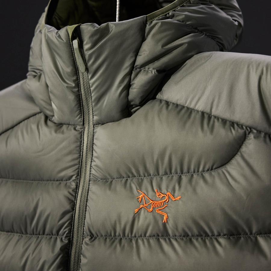 a close up of a jacket with a logo on it