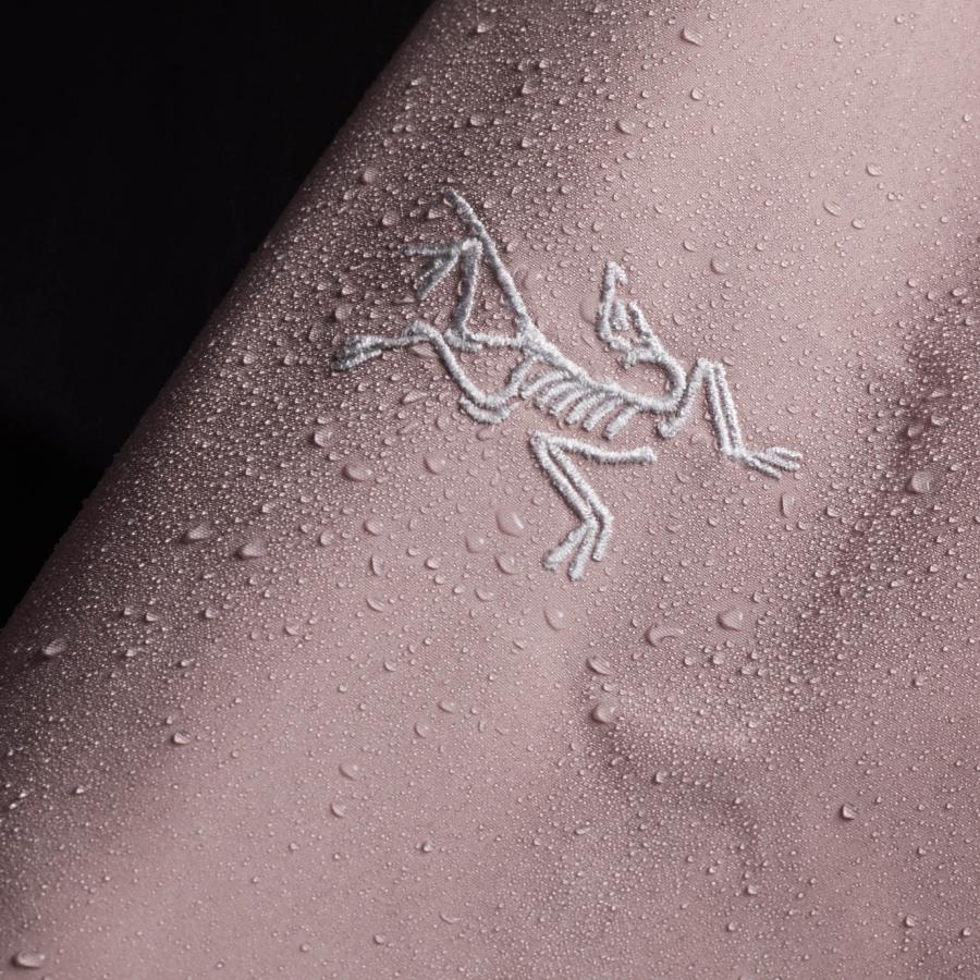 a close up of a piece of clothing with water drops on it .