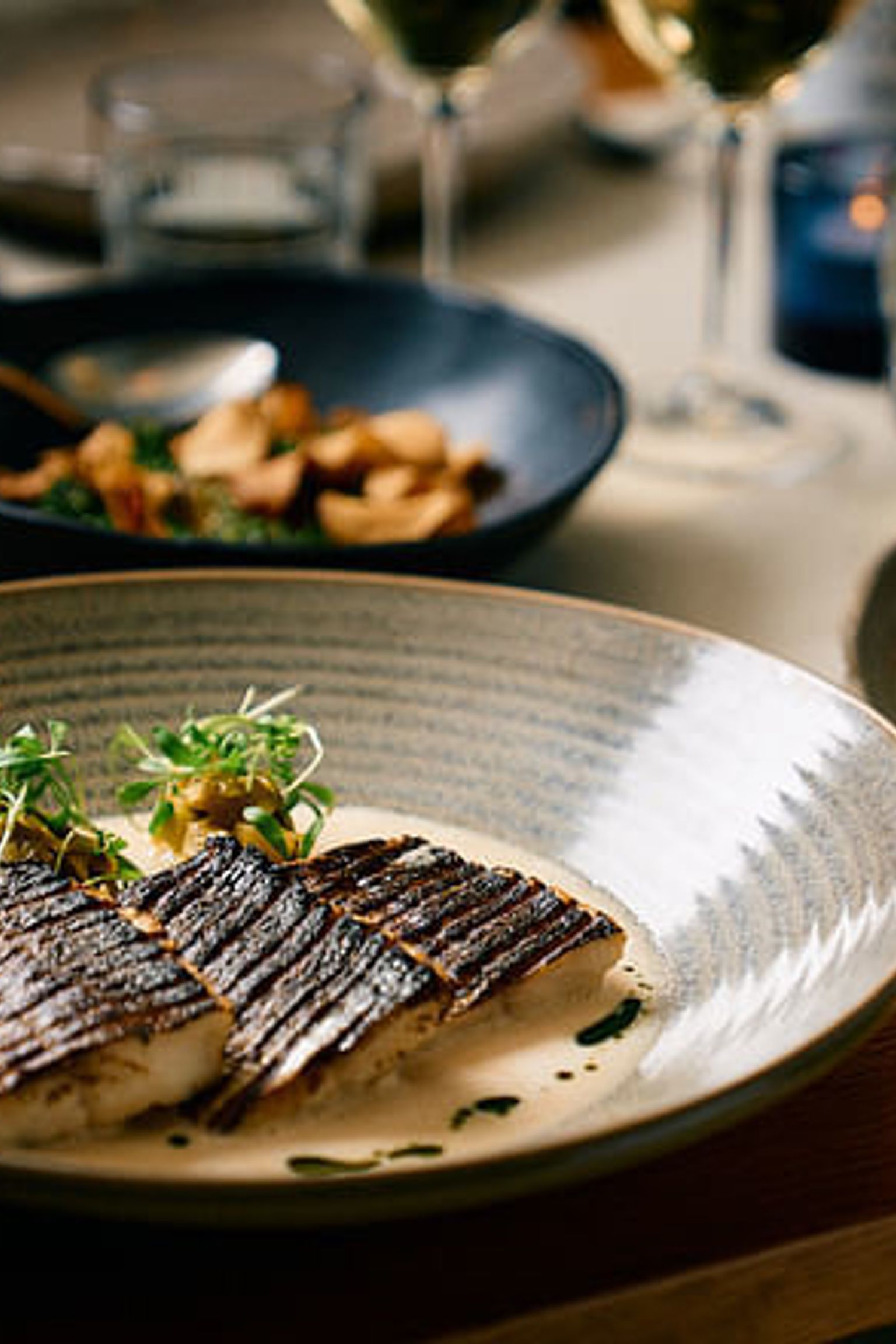 a plate of food is sitting on a wooden table