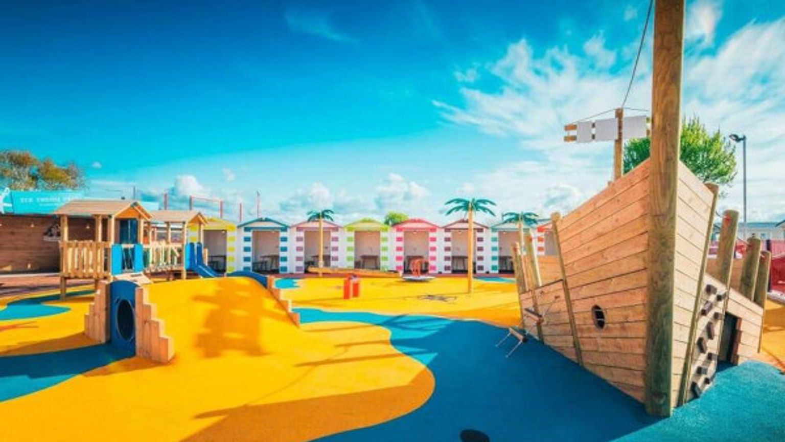 there is a pirate ship in the middle of the playground.