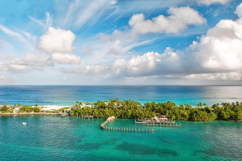 an aerial view of a small island in the middle of the ocean
