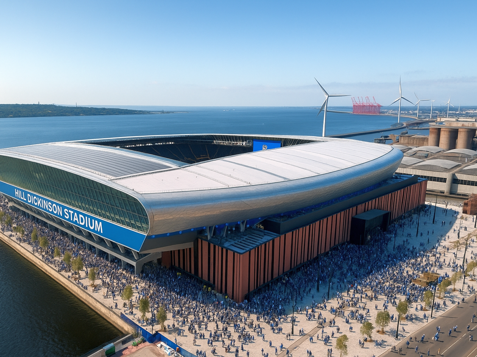 Vista aérea do moderno estádio Hill Dickinson, rodeado por multidões, próximo à água com turbinas eólicas e edifícios industriais ao fundo.