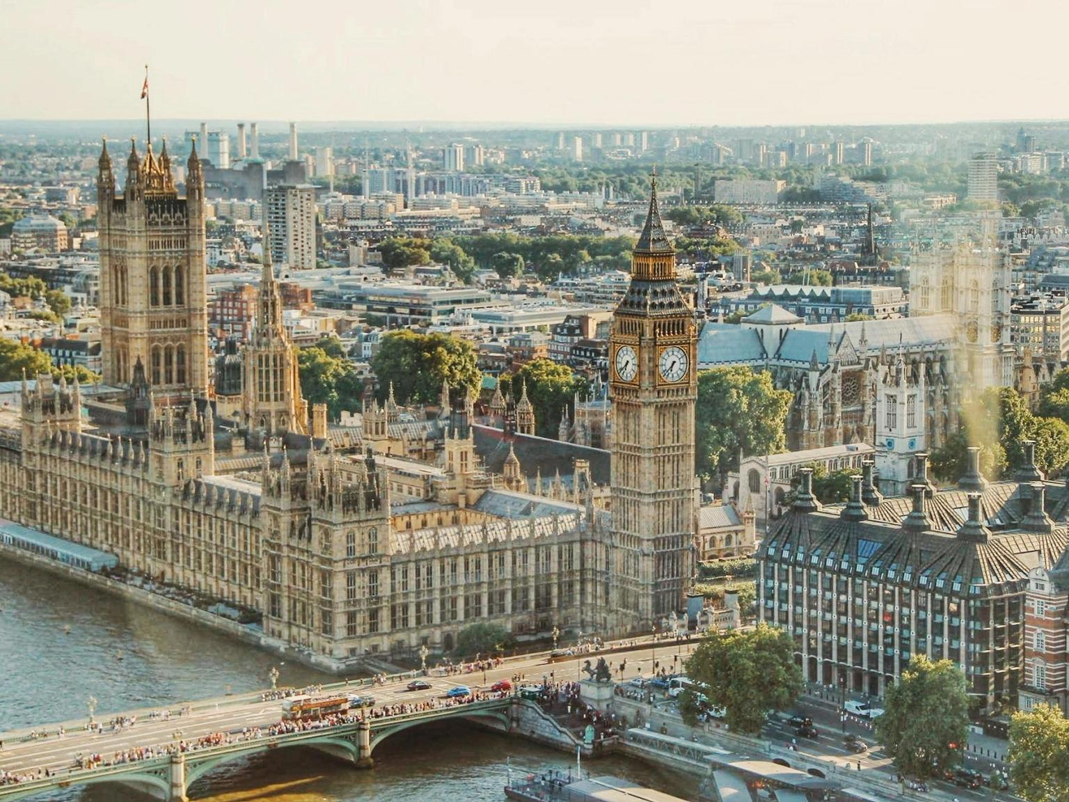 an aerial view of the houses of parliament and big ben in london