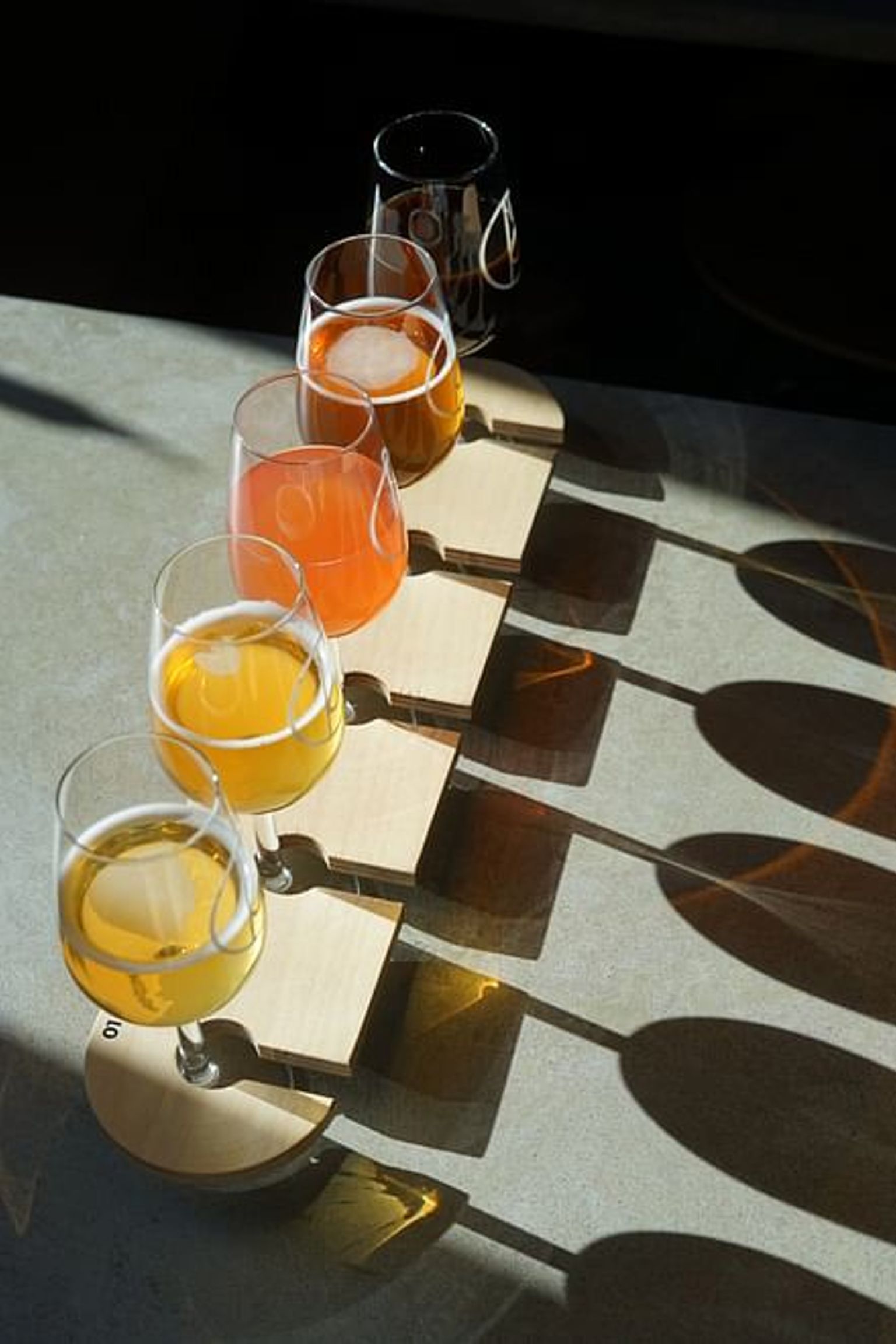 a row of wine glasses with the number 9 on them