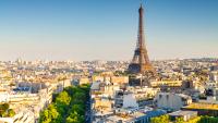 eine Luftaufnahme von Paris mit dem Eiffelturm im Hintergrund