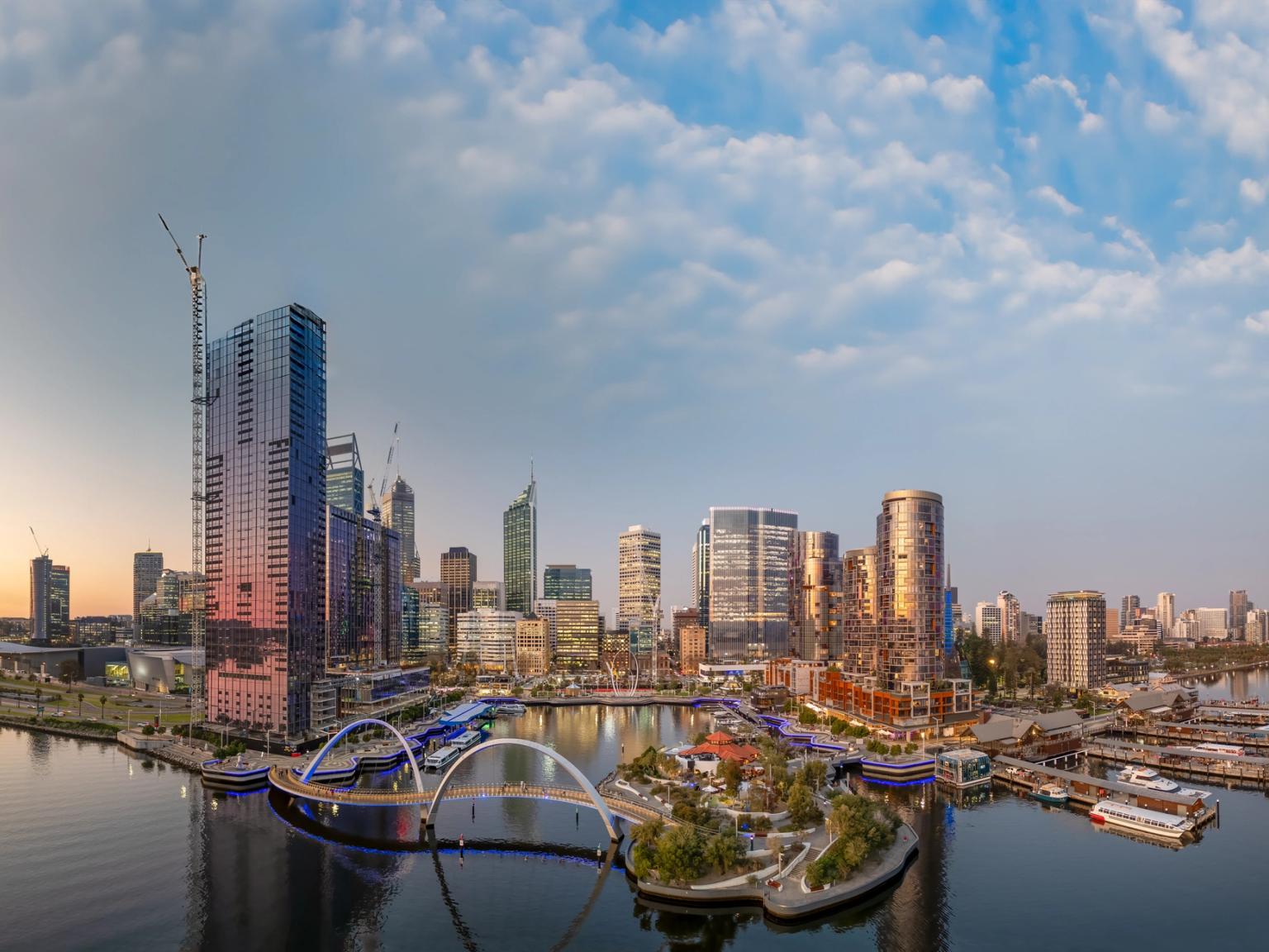 en luftig utsikt over en byskyline med en bro over et vann