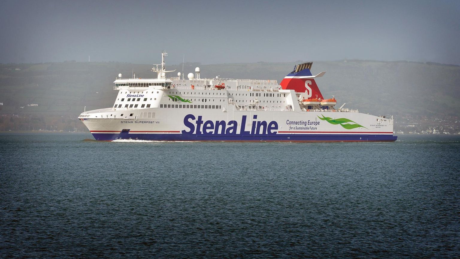 a large Stena Line cruise ship is floating on top of a body of water.