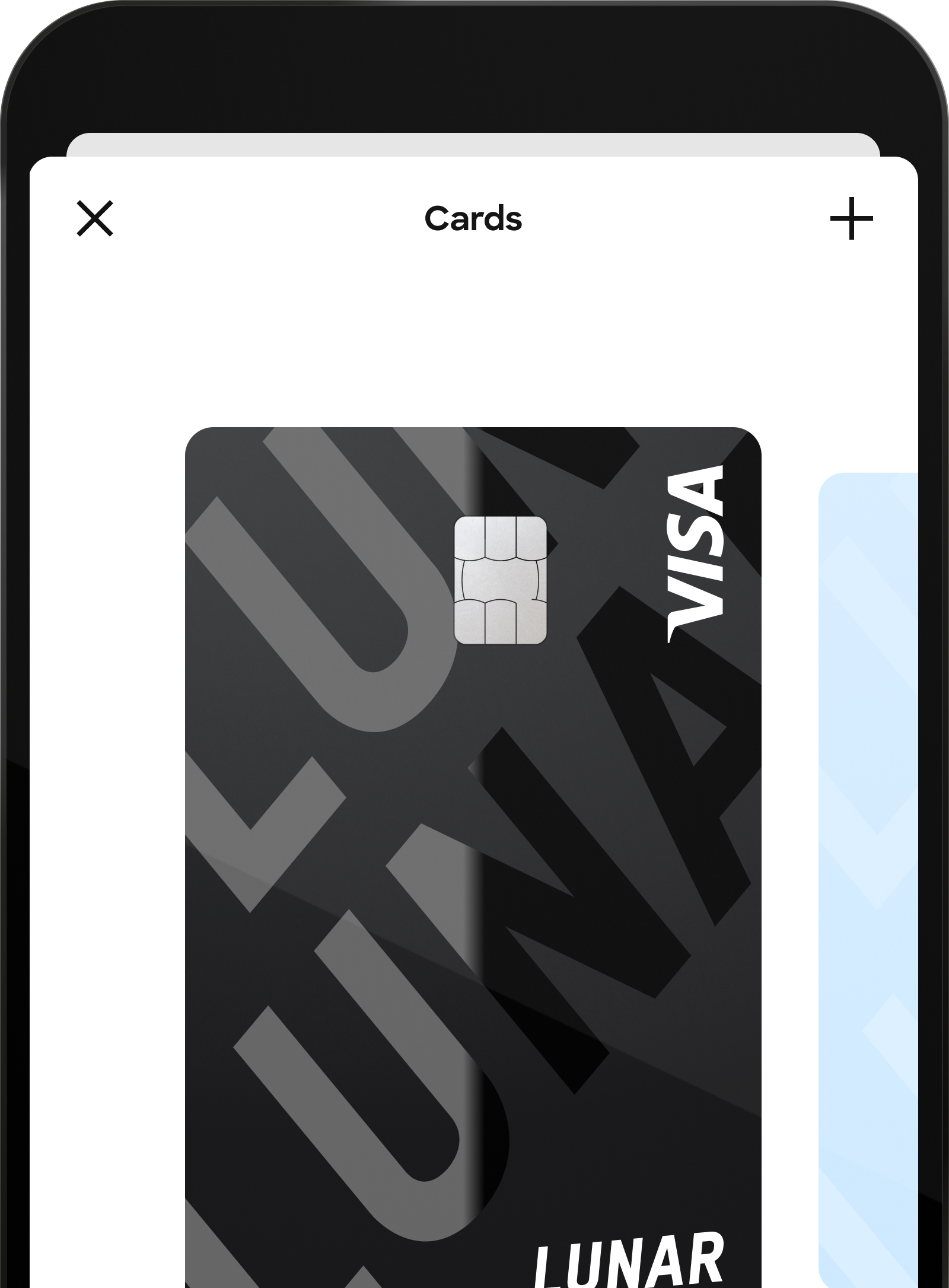 A close-up of a mobile app's "Cards" screen, displaying a digital black Lunar Visa card with a glossy logo pattern.