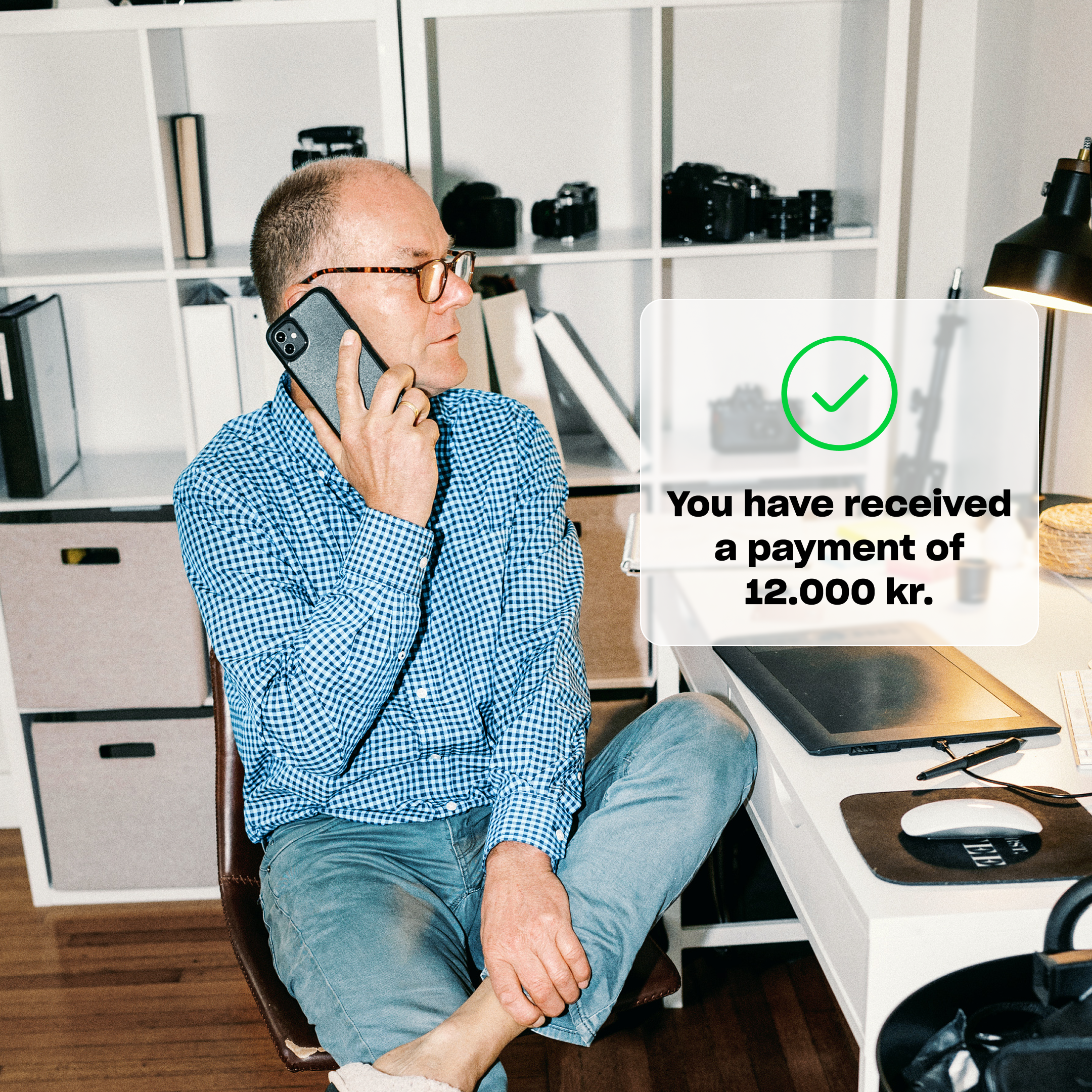 Man on phone + payment notification hero 