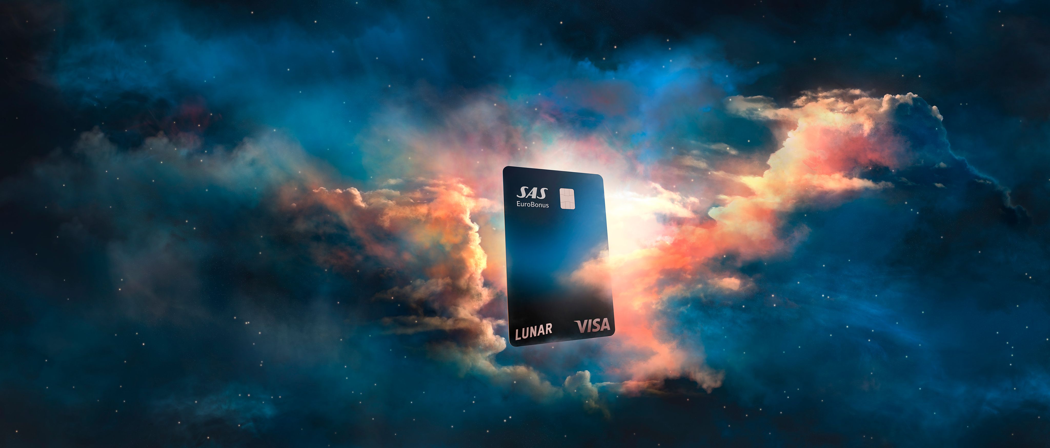 A Lunar SAS EuroBonus Visa card floating amongst colorful, dream-like clouds under a starry night sky.
