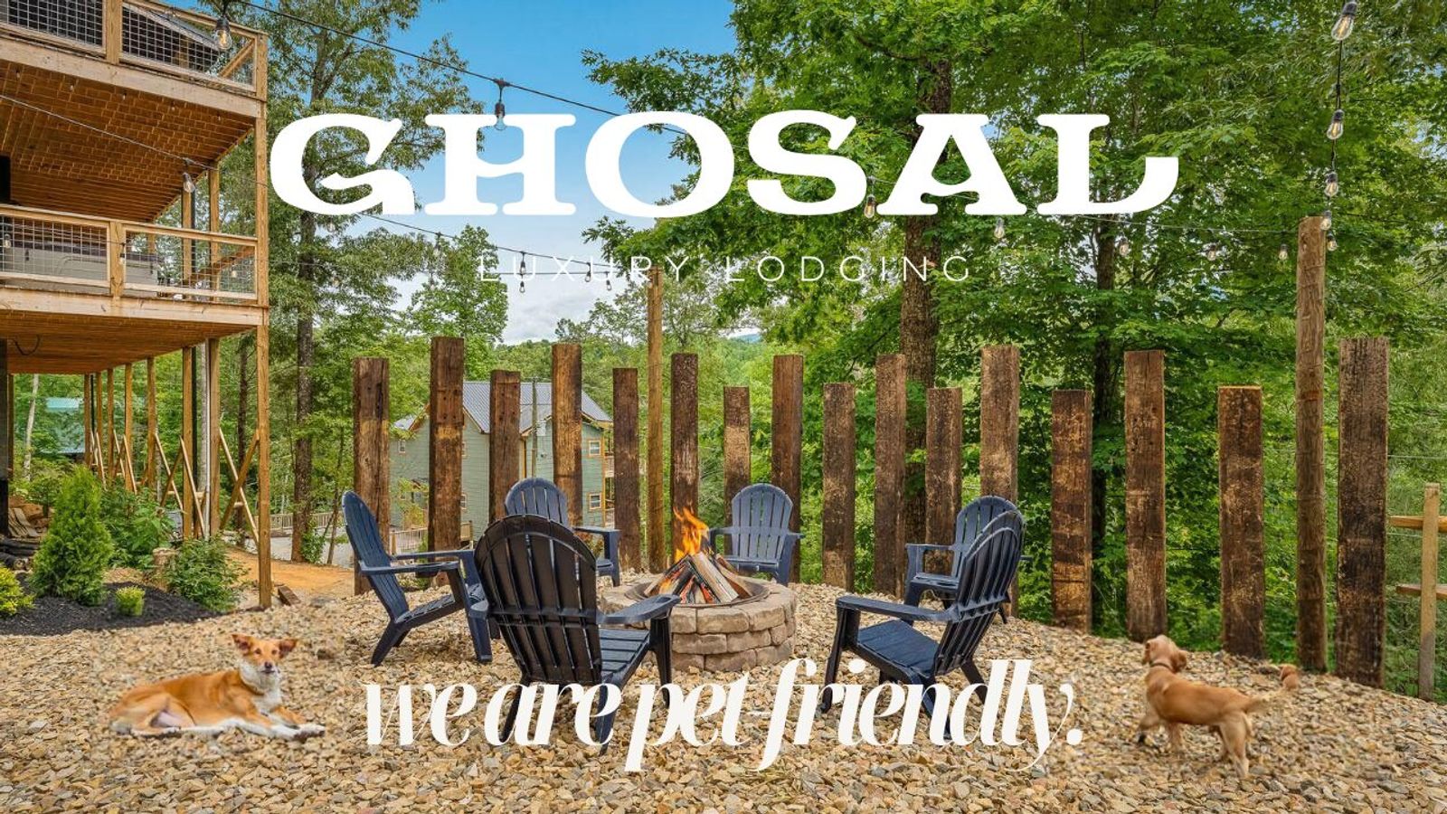 Outdoor fire pit area with Adirondack chairs, surrounded by tall wooden posts and trees in Gatlinburg. Two dogs are nearby. Text reads, “GHOSAL Luxury Lodging. We are pet friendly—enjoy Pet-Friendly Activities.”.