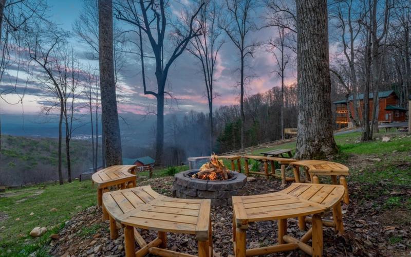 View of Smoky Mountains at dusk with scattered cabins.