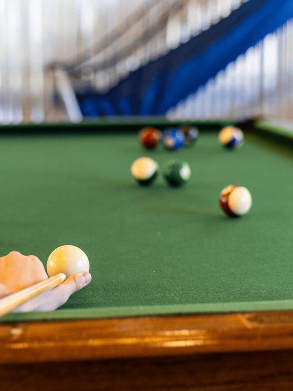 A person playing pool.