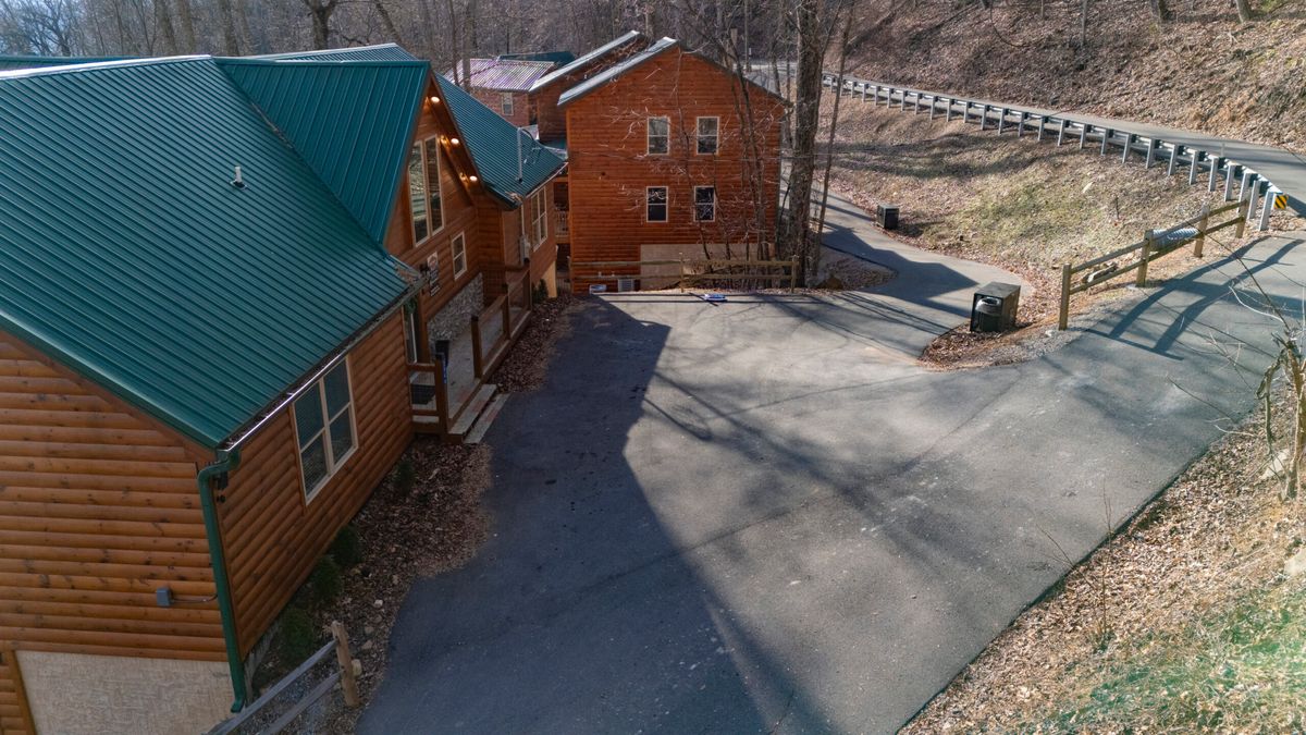 Aerial view of a Smoky Mountain cabin community and parking areas