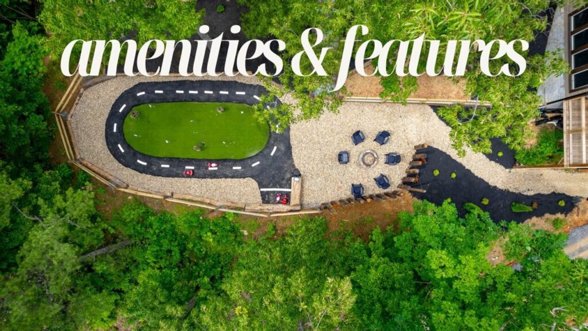 Aerial view of a landscaped outdoor area featuring a mini go-kart track, green turf, and a circular seating area with chairs around a fire pit—all surrounded by trees. The text amenities & features appears at the top, highlighting Why We Stand Out.