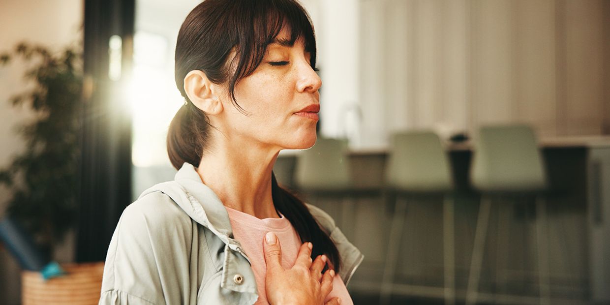 Cheap Clairvoyant Readings - A female clairvoyant reader meditating.
