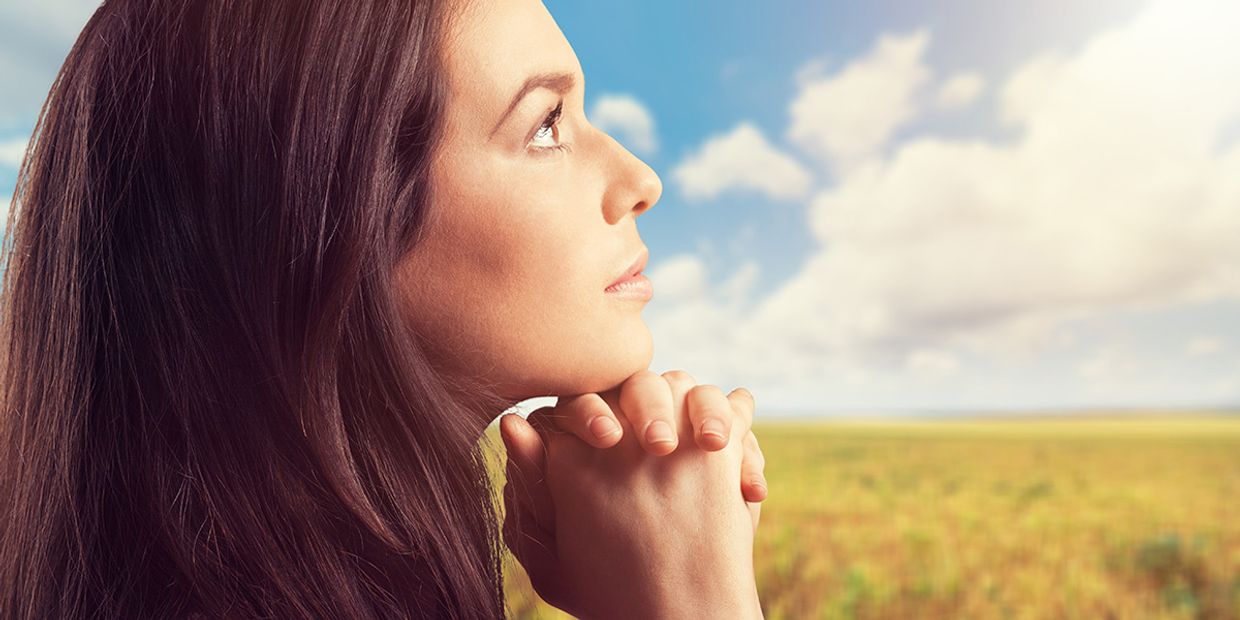 A lady looking to the sky, looking for self forgiveness.
