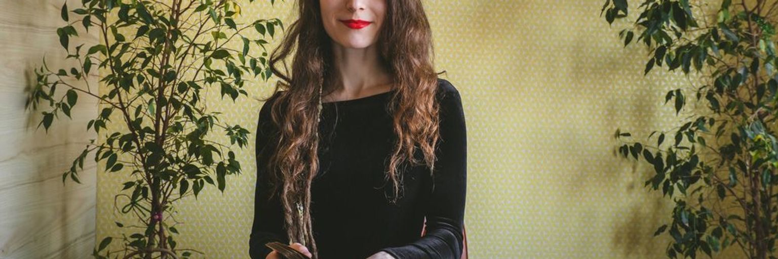 A Psychic Reader, reading Tarot cards
