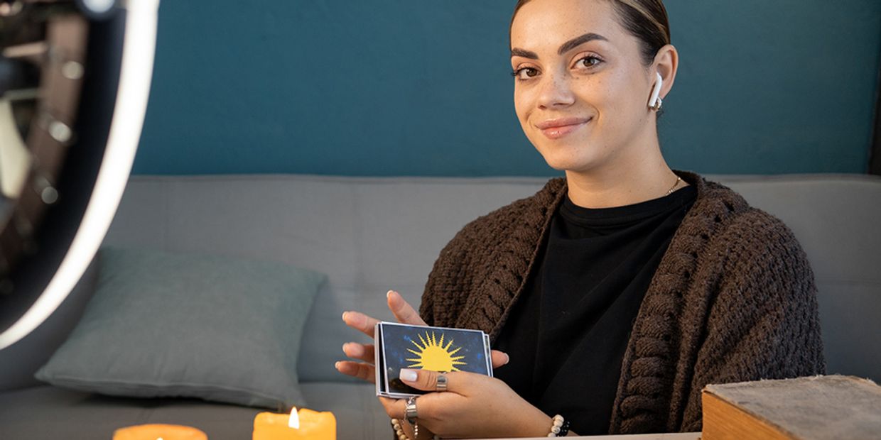 Clairvoyance vs Other Psychic Abilities - A clairvoyant using her tarot cards.