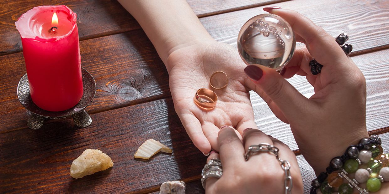 A love psychic reading using a crystal ball.