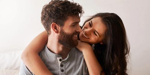 A couple in love, hugging each other.