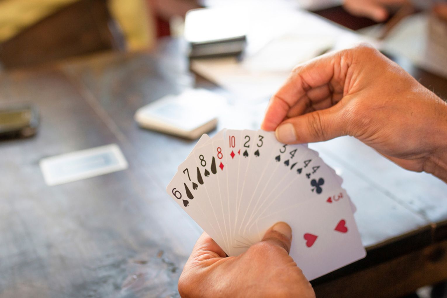 A woman showing a card spread