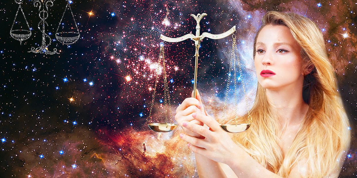 Woman holding golden scales against a cosmic galaxy background, symbolising Libra traits of balance, harmony, and spiritual intuition.