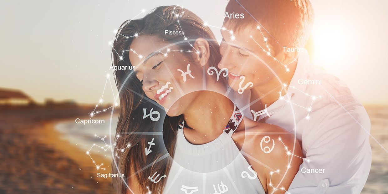 Couple together with zodiac signs and birth chart overlay.