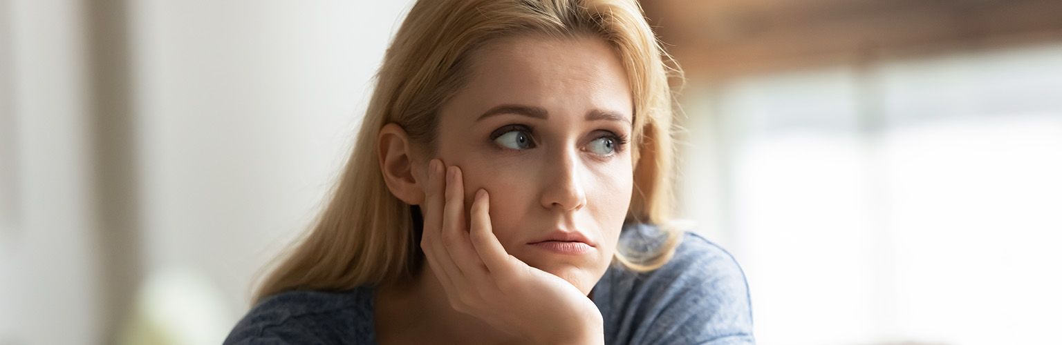 Woman contemplating her relationship: Does he love me?