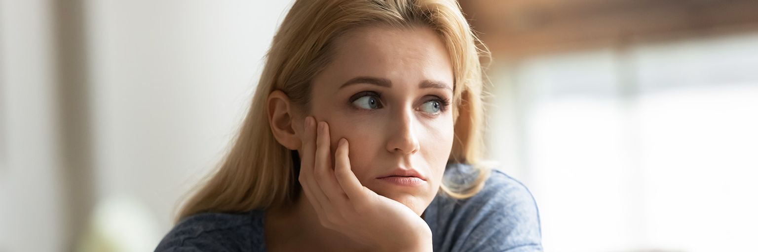 Woman contemplating her relationship: Does he love me?