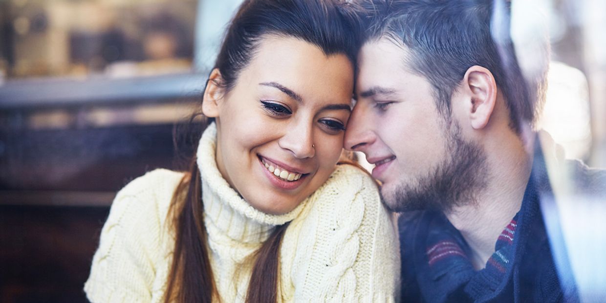 A couple enjoying each other's company, contemplating love and reunion.