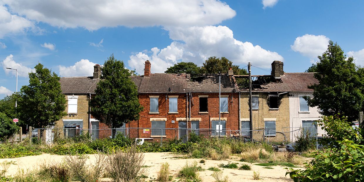 Picture of dilapidated housing in the UK.