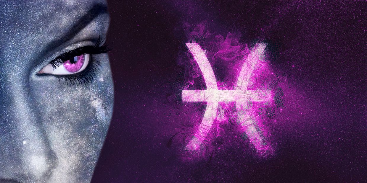 Pisces zodiac symbol set beside a mysterious looking female.