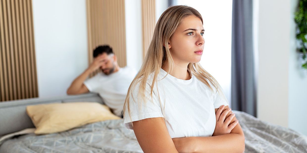 Couple in emotional distress seeking psychic love advice after a breakup.