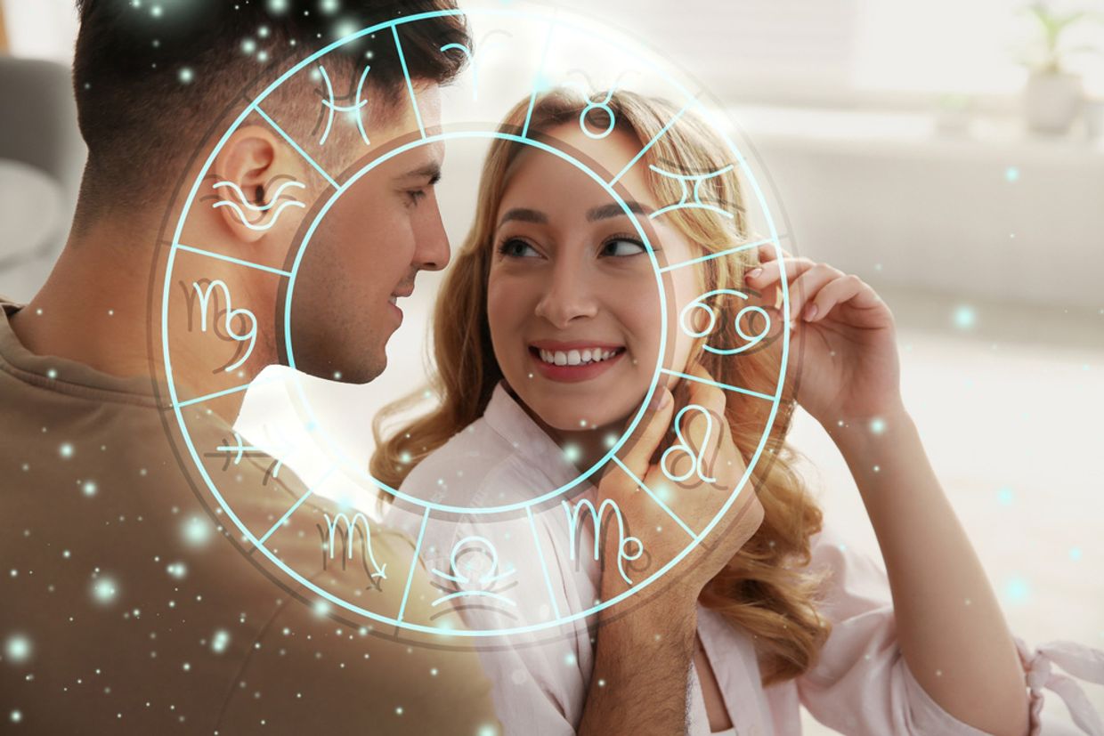 A couple in love with a horoscope chart