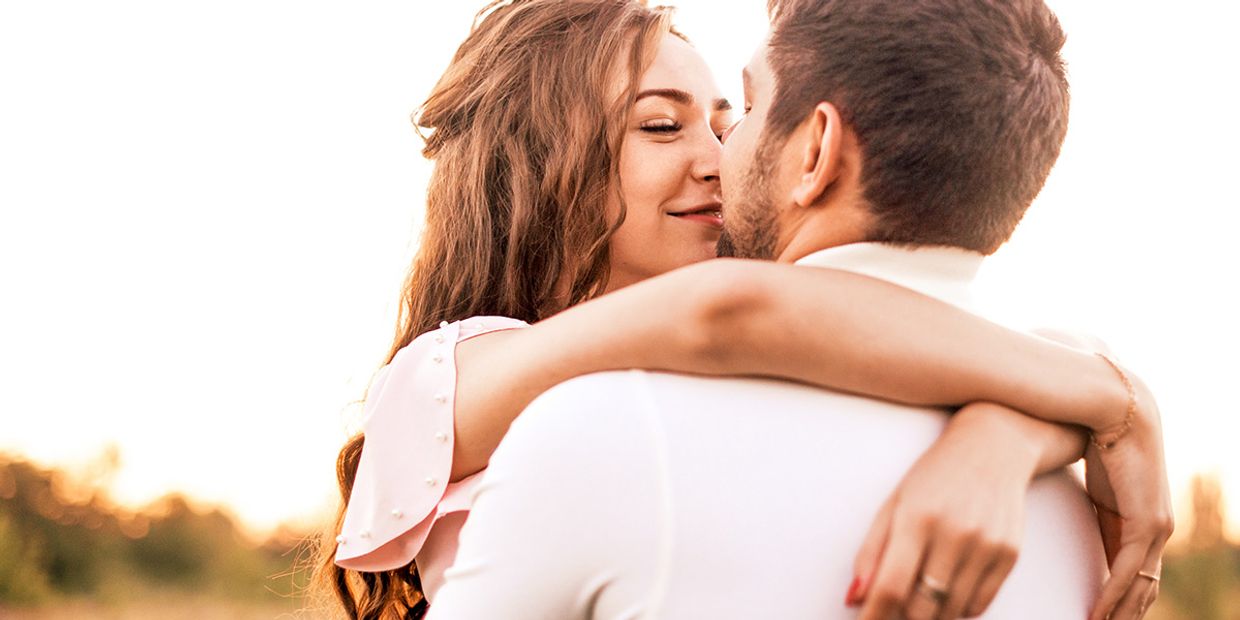 Psychic Love Reading - A couple embracing, looking like their in love.