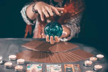A Psychic reader with a crystal ball
