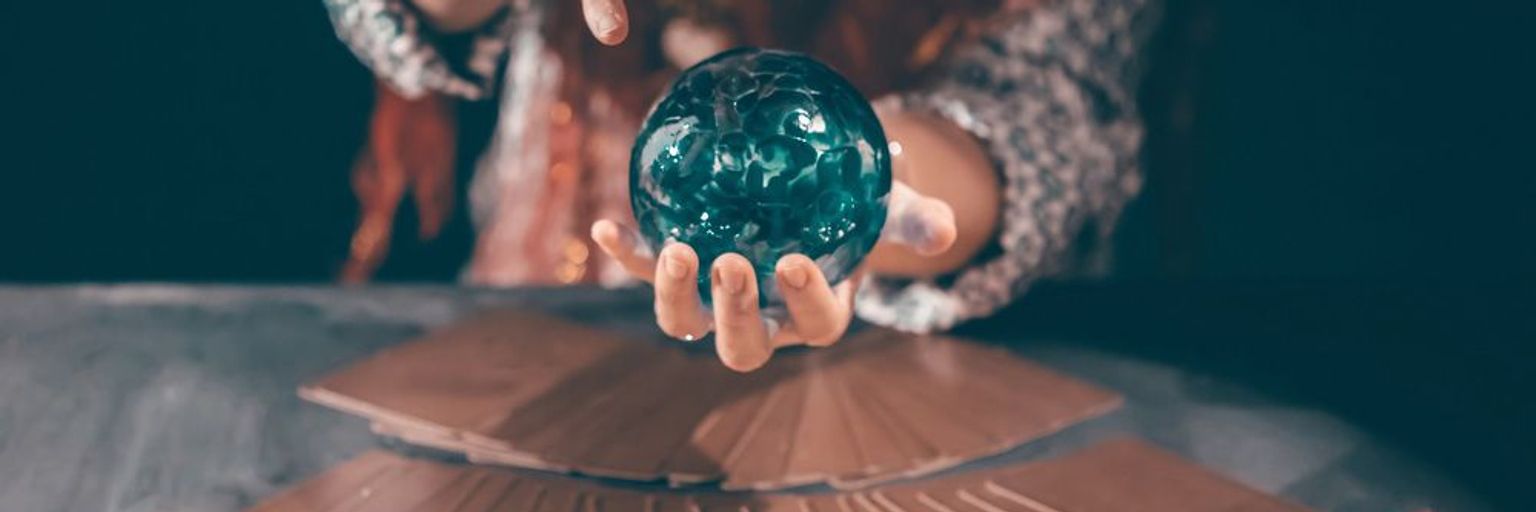 A Psychic reader with a crystal ball