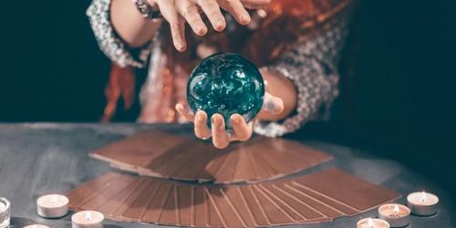 A Psychic reader with a crystal ball