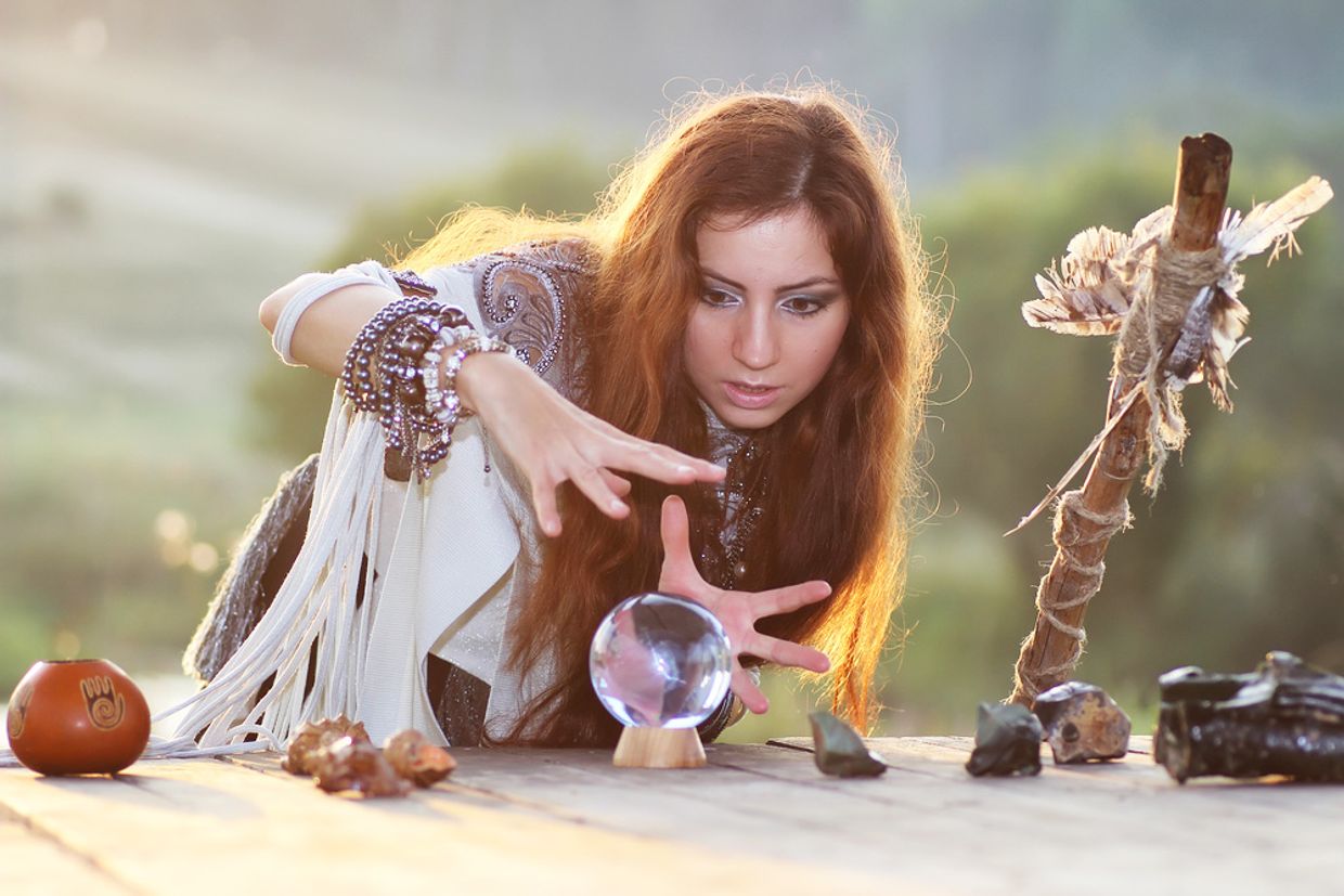 A spiritual reader connecting with her crystal ball