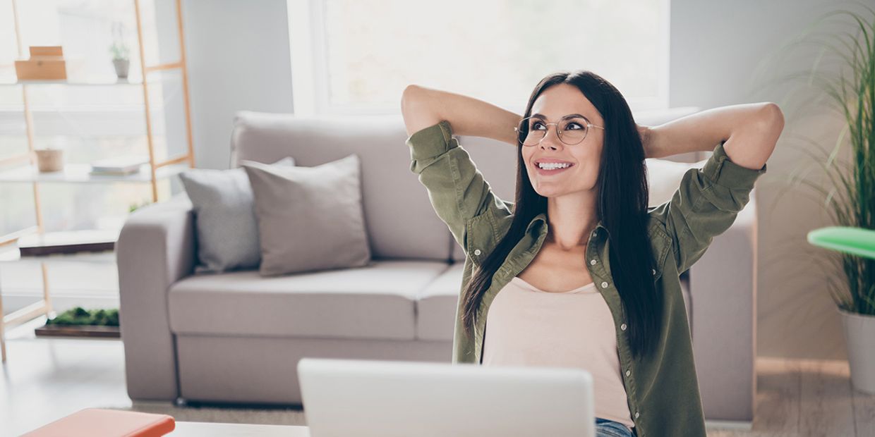 A happy woman working from home