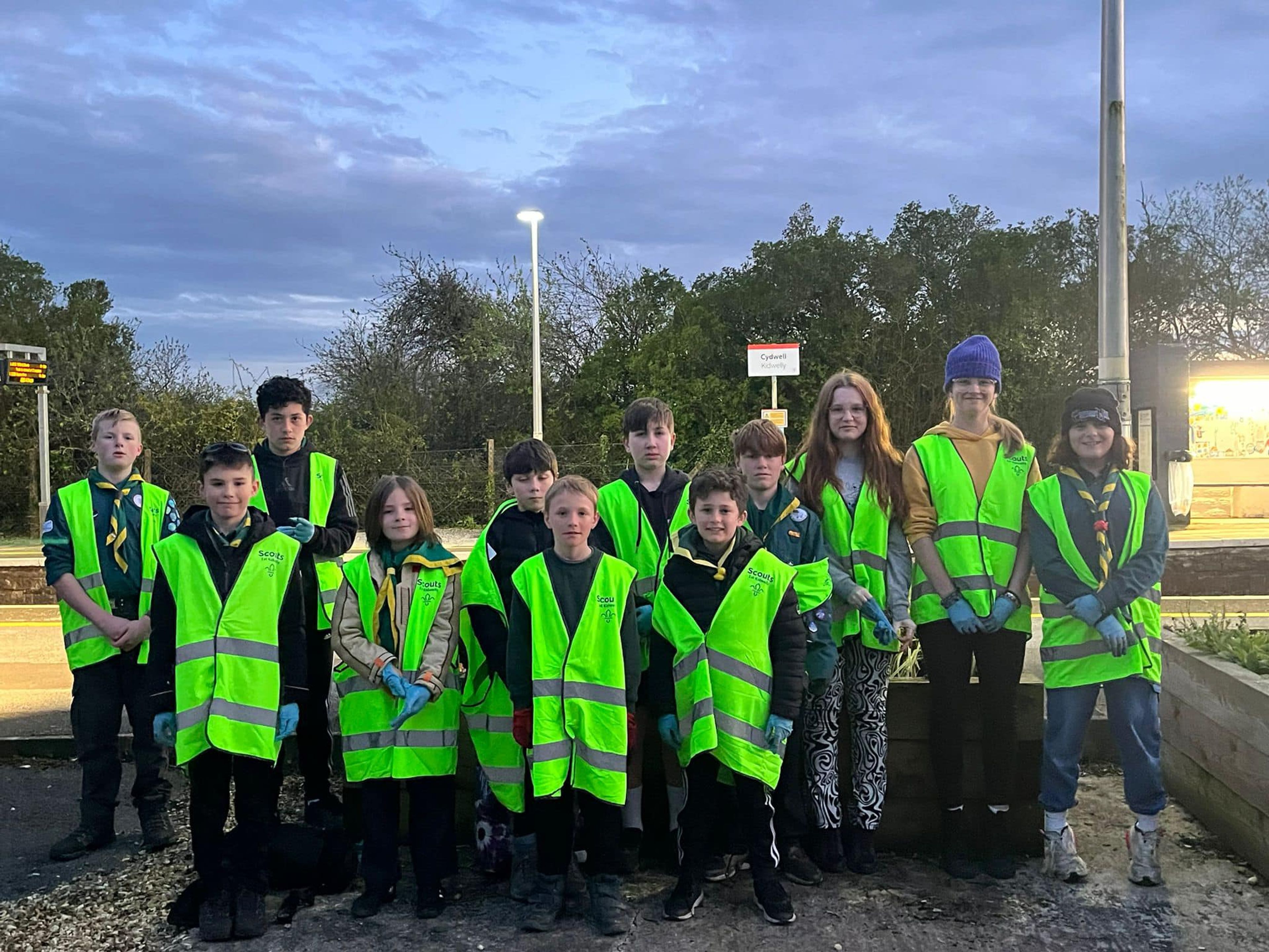 Members of 1st Kidwelly scouts at a train station