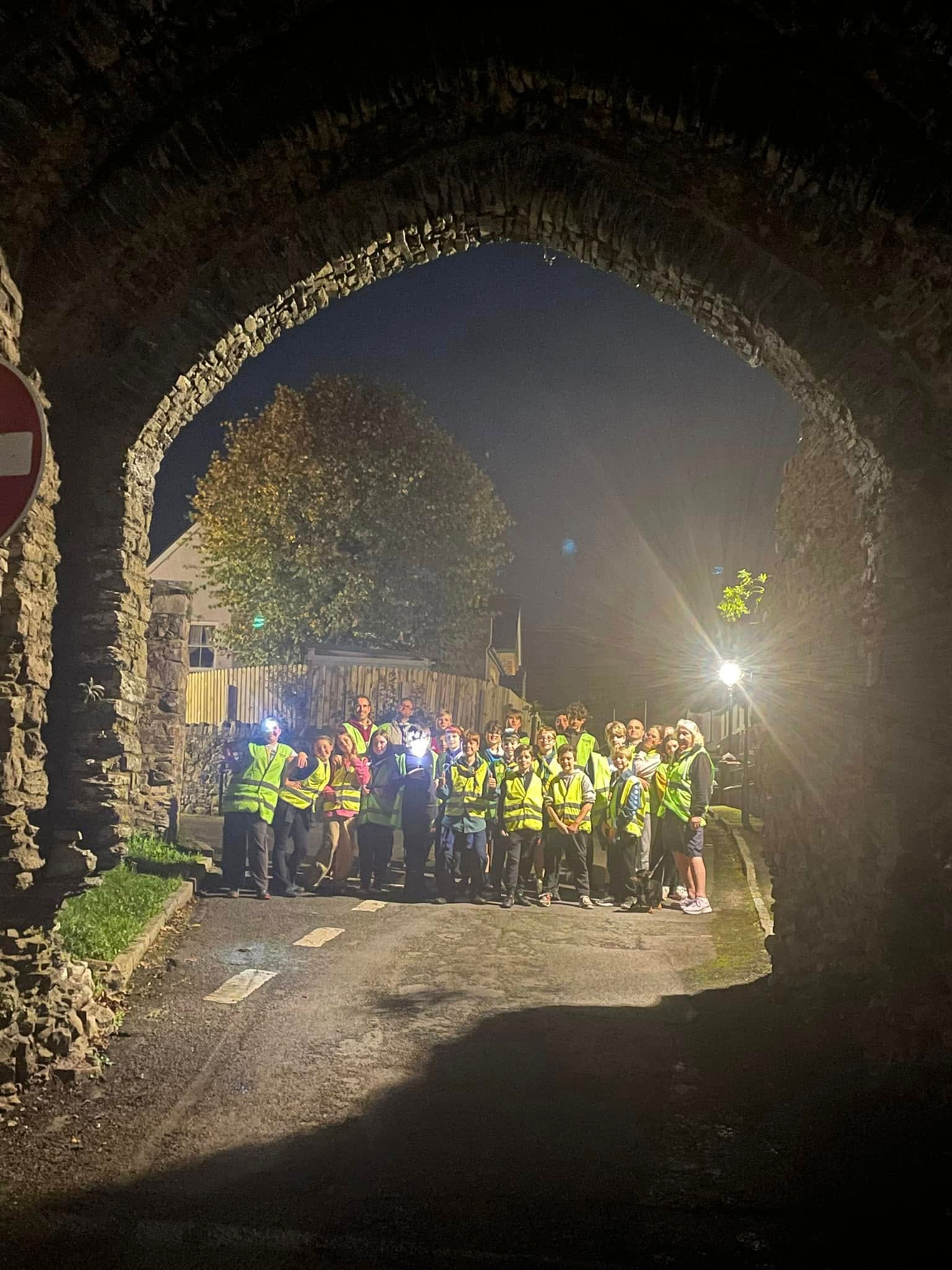 Members of 1st Kidwelly outside by a gatehouse