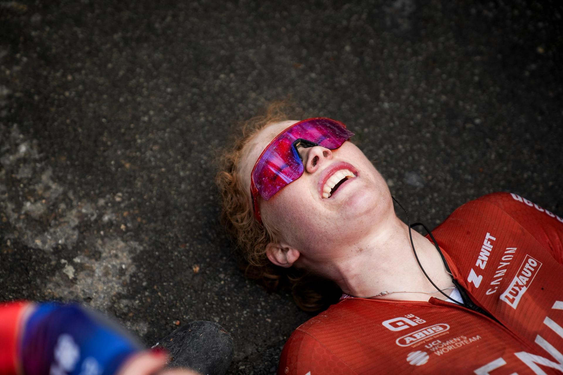 Puck Pieterse of Fenix-Permier Tech lying on the floor post-stage finish at the 2025 La Flèche Wallonne - picture credit: ASO