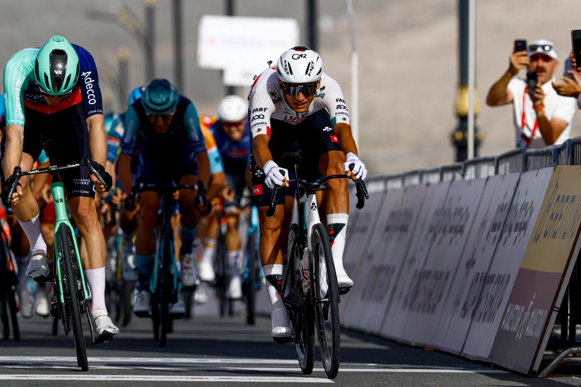 UAE Tour: Isaac del Toro sprints to stage 1 victory and leader's jersey with late uphill attack as Milan crashes