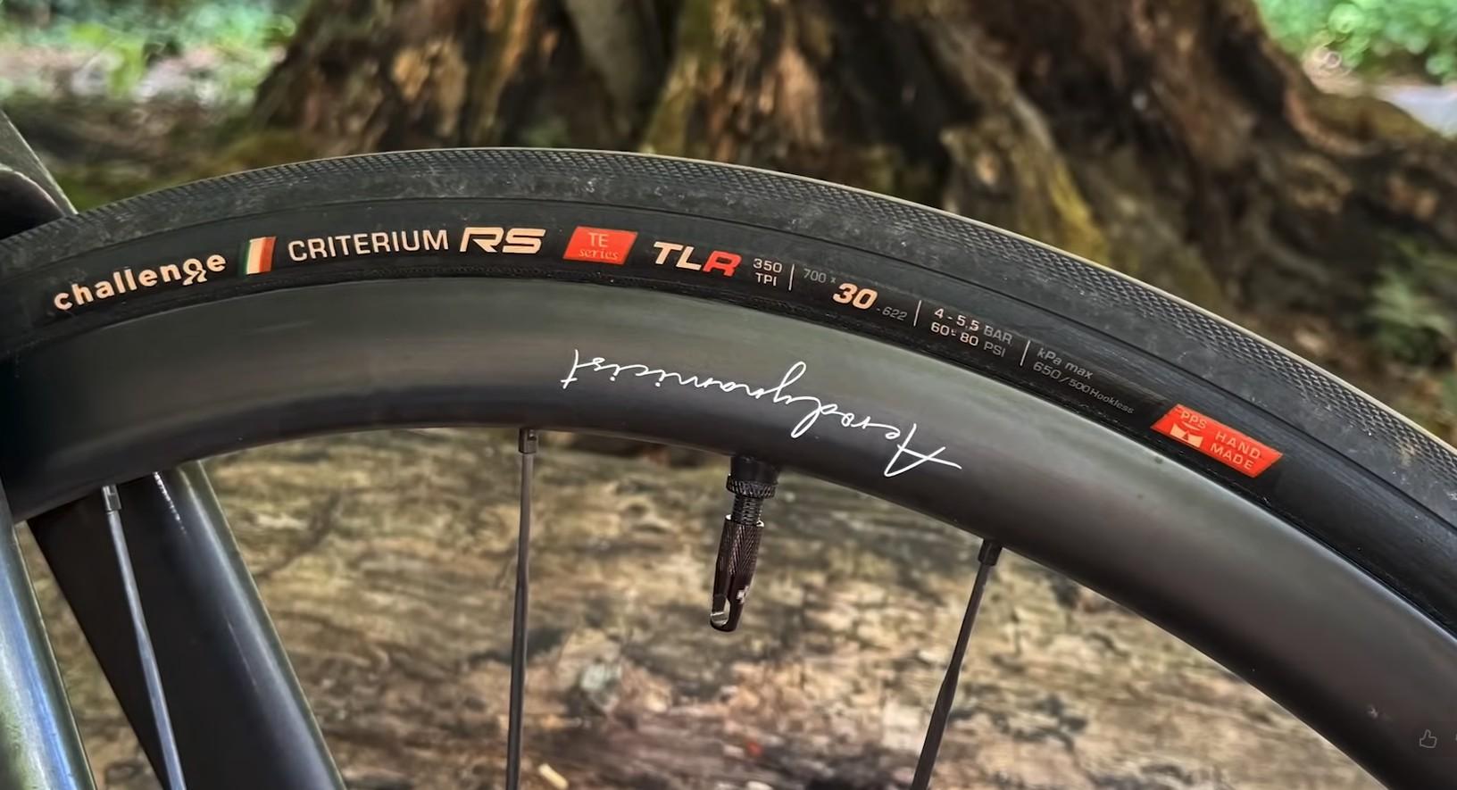 Close-up of a Challenge Criterium RS tire mounted on an Aerodynamicist carbon road bike rim.