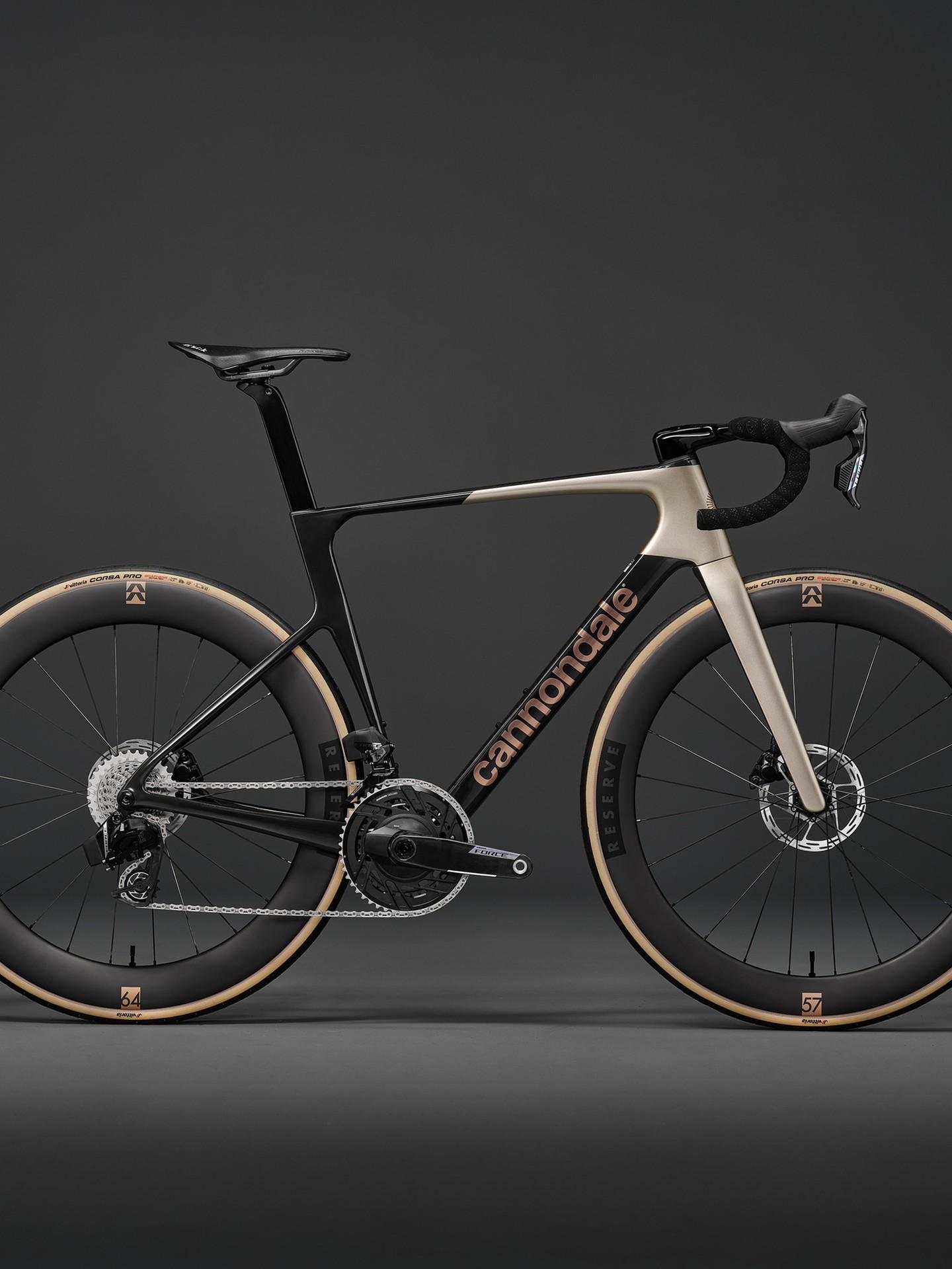 Black and champagne Cannondale SuperSix EVO carbon road bike with Reserve wheels and tan-wall tires.