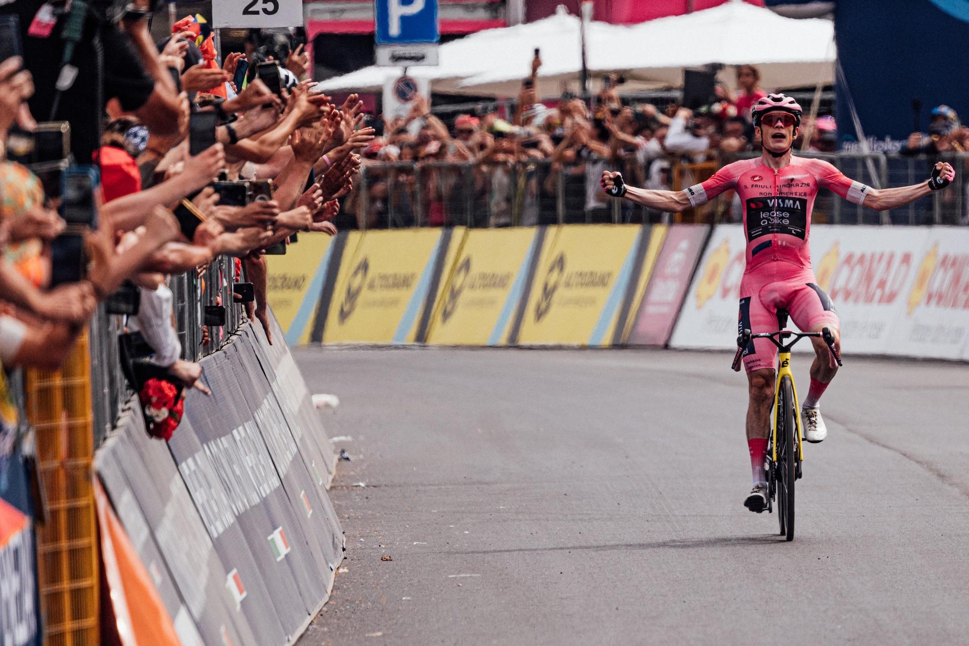 Jonas Vingegaard rides to victory on the Giro d’Italia Stage 20 finish amid cheering crowds